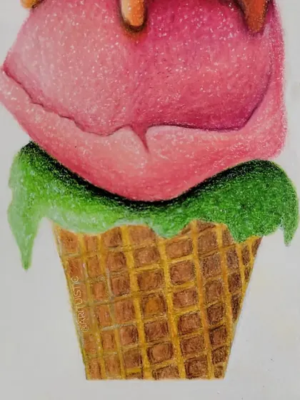 A close-up of the bottom two scoops and the cone, showing the waffle texture.