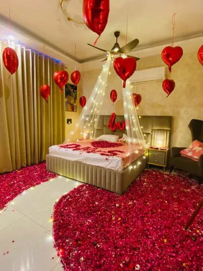 A duplicate of image 33, providing another angle of the luxurious and romantic bedroom decoration.