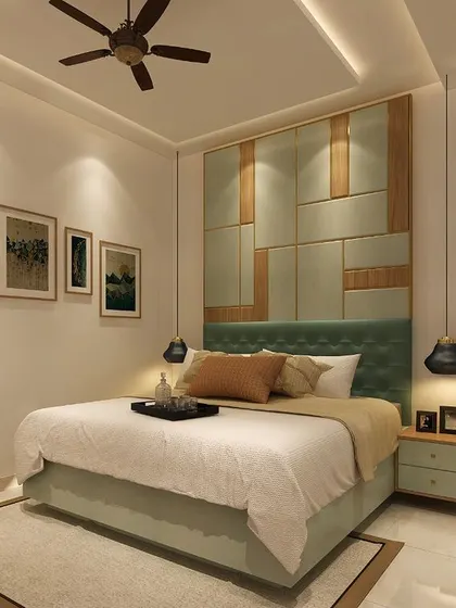 This bedroom concept uses a beautiful headboard wall with mint green and wood-finish panels. The framed art and pendant lights complete the look.