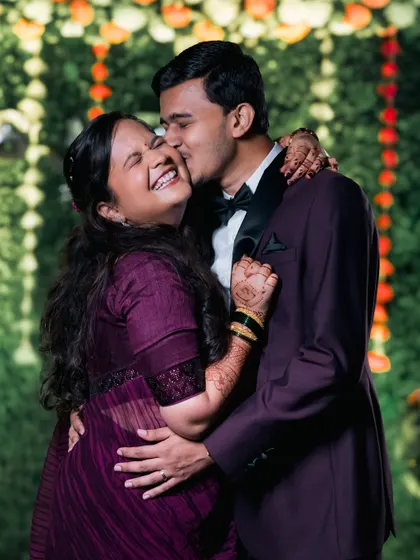 Pure happiness! A spontaneous kiss filled with so much laughter and joy. These are the candid, heartfelt moments we live to capture during your engagement celebration.
