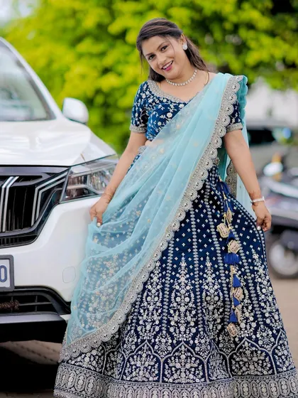 The perfect outfit for a grand occasion. This client is all smiles in her custom lehenga.