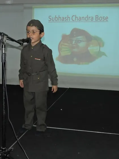 A student dressed as Subhash Chandra Bose delivers a speech, honoring the great freedom fighter's contribution to India.