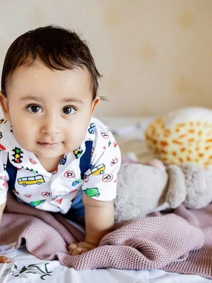 This sweet boy is on the move. Capturing milestones like crawling is perfect for an at-home session where your baby feels most comfortable to explore.