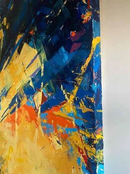 An angled view of the 'Confluence' abstract, showing the texture and the way the colors wrap around the canvas edge.