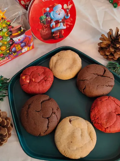 Another look at my festive cookie jar. The assortment includes red velvet, chocolate, and classic butter cookies, perfect for sharing.