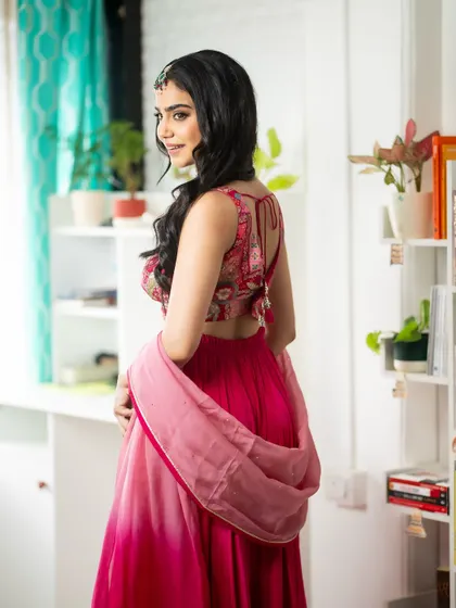 A back profile shot to display the design of the blouse and the flow of the dupatta. I make sure to capture the outfit from all important angles.