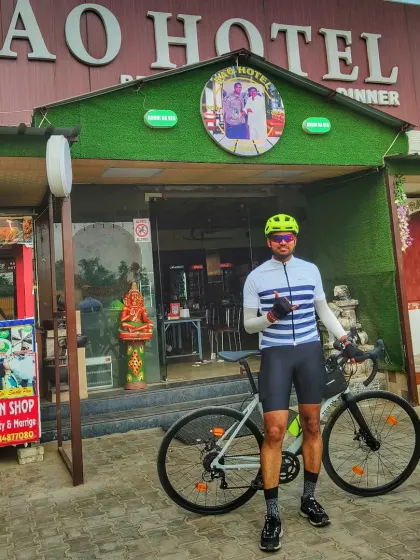 Standing proud with his road bike after a 100km challenge. These rides are not just about fitness, but about pushing your personal boundaries.