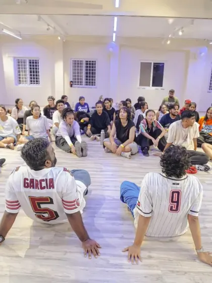 Students and instructors relaxing after a high-energy session at our Collab Series 2.0.