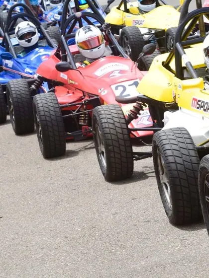 The view from the front of the grid, with a full field of formula cars ready to launch.