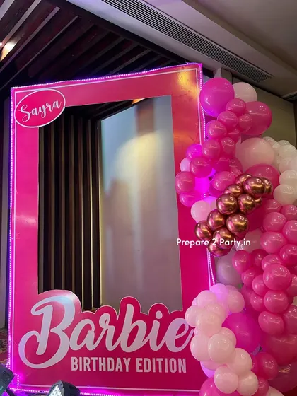 See more of my Barbie themed decorations, showcasing elements like custom welcome signs, life-size photo booths, and elegant table centerpieces that bring the iconic doll's world to life.