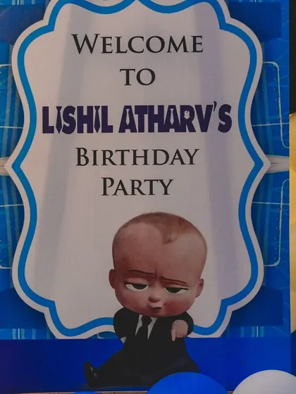 A personalized welcome sign for Lishil Atharv's Boss Baby-themed birthday party, inviting guests to the little boss's big celebration.