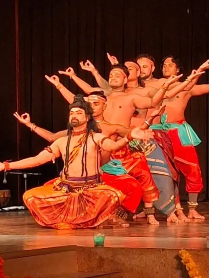 A formation from a Chhau performance depicting a multi-armed deity. My dancers work together to create a larger-than-life visual, a hallmark of my choreographic style.