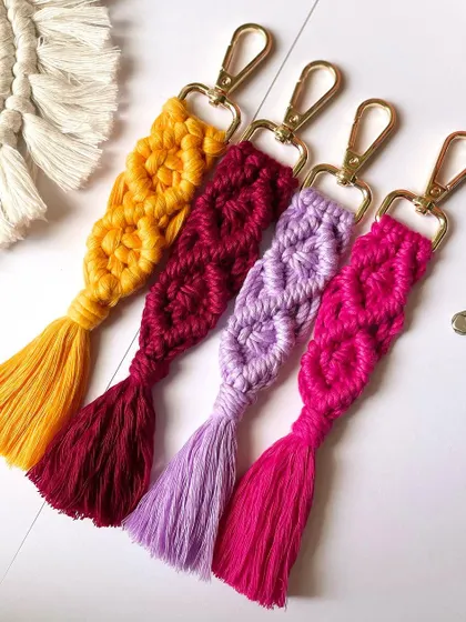 I love playing with bright colors! These diamond-pattern keychains in yellow, magenta, purple, and pink are sure to add a pop of brightness to your day.