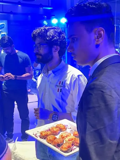 Our staff circulating with trays of freshly made starters at the Triumph showroom launch. This pass-around service is perfect for product launches and networking events where guests are mingling.