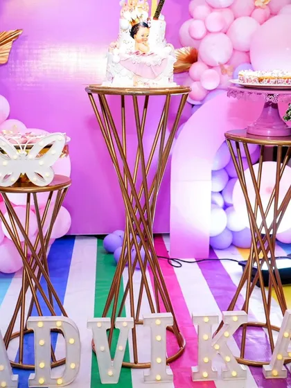 The dessert table setup for Advika's stylish butterfly party.