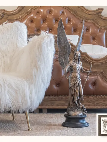 This striking Angel of Battle floor statue is a powerful and dramatic statement piece. Its impressive height and detailed craftsmanship make it a focal point in any room, symbolizing strength and protection.