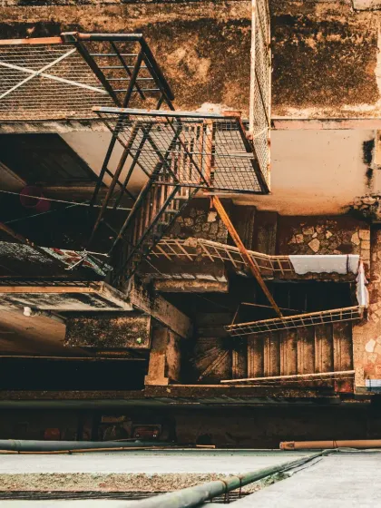 A top-down view into a building's courtyard, a risky shot that paid off. This perspective creates a dizzying and abstract architectural image.