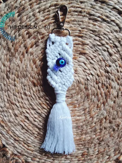 This macrame evil eye keychain is a perfect choice for a trendy bag tag or charm. It's a great handmade, sustainable gift to protect your loved ones.