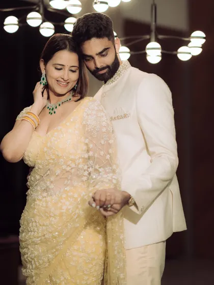 A quiet, intimate portrait that showcases the couple's connection. The focus here is on their bond, framed by soft, beautiful lighting.