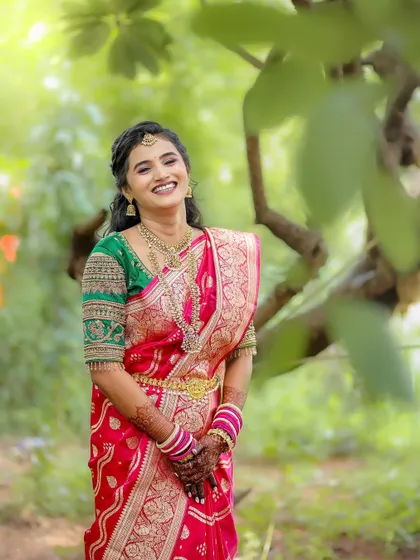 A joyful portrait of the bride, laughing brightly in her traditional Maharashtrian attire. Her happiness is infectious, and it's these moments I strive to capture.