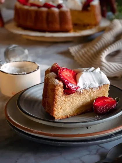 Strawberries fill our bundt cake... "When you buy HANDMADE… You support a DREAM…" accompanies this photograph by @johnciecorreia.photography.