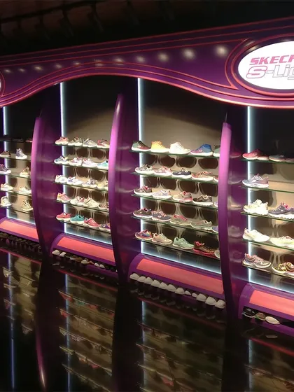 A playful and vibrant display designed specifically for the Skechers S-Lights collection. I used curved forms and colorful lighting to create a fun, eye-catching section within the showroom that appeals to a younger audience.