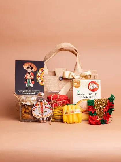 A clean, centered shot of the 'Kaithola' hamper and its contents. This simple arrangement is perfect for corporate gifting or as a thoughtful gesture for friends and family.