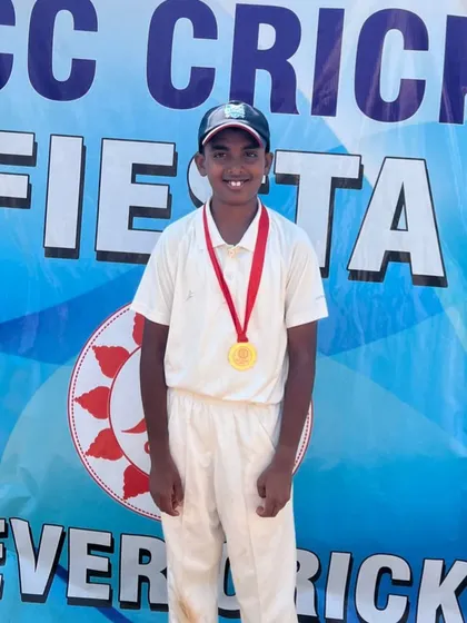 Aniruddh M with his medal.