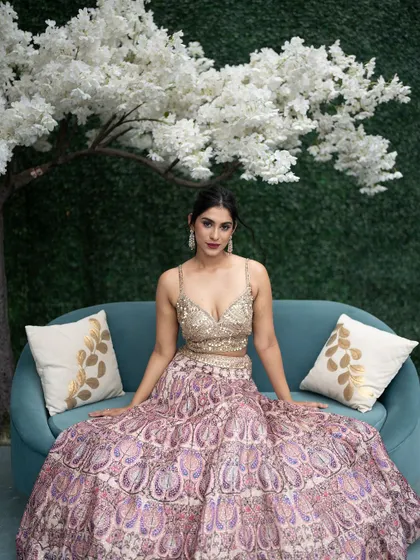 This shot captures the essence of a dreamy, festive look. The makeup was designed to be soft yet glamorous, with a focus on radiant skin and eyes that sparkle, complementing the beautiful ethnic wear.