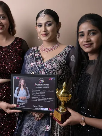 Certification day is a huge milestone. Here I am presenting a student with her diploma and a trophy for her excellent work.