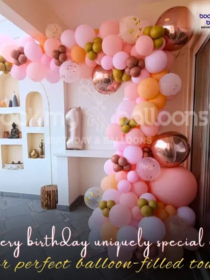 This image of a beautiful pastel balloon arch shows how every birthday can be uniquely special. Our perfect balloon filled touch can transform any space into a celebration.