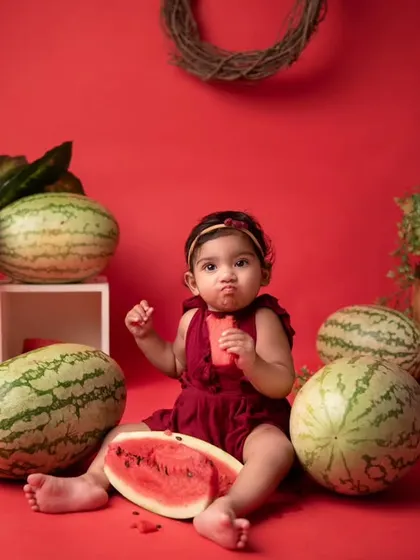 It's not a watermelon smash without a little taste test! These candid moments of babies exploring the props are what make each session so special and unique.