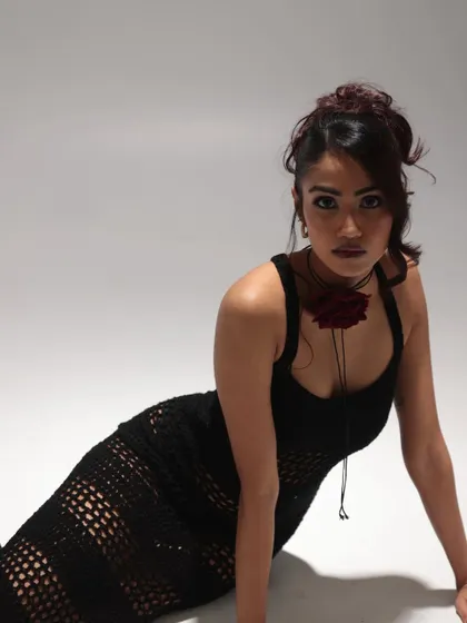 An edgy look featuring a dark smokey eye and a nude lip. I styled the hair in a messy, textured updo to match the high-fashion, slightly grunge aesthetic of the shoot.