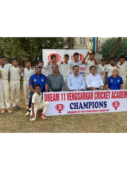 The entire U-14 champion squad with their trophies and the prize distribution committee.