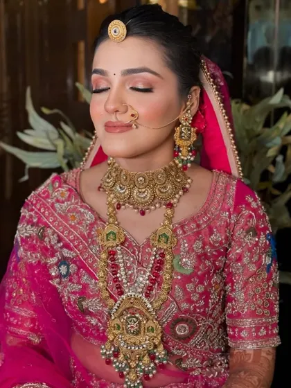 A close-up of the soft glam bridal makeup. You can see the subtle shimmer on the eyelids and the perfectly blended foundation that looks like second skin.