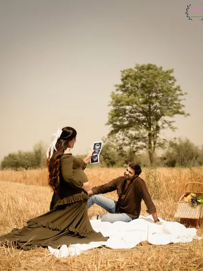 A lovely picnic setup for Shireen and Hasan's pregnancy announcement, sharing the ultrasound pictures in a relaxed, natural setting.