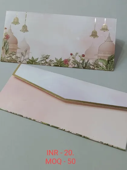 A beautiful money envelope showcasing majestic peacocks and lotus flowers against a subtly striped background. The gold foil on the peacock feathers adds a touch of opulence.