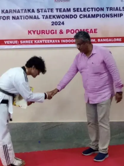 A bow of respect and gratitude after receiving his certificate at the state team selection trials.