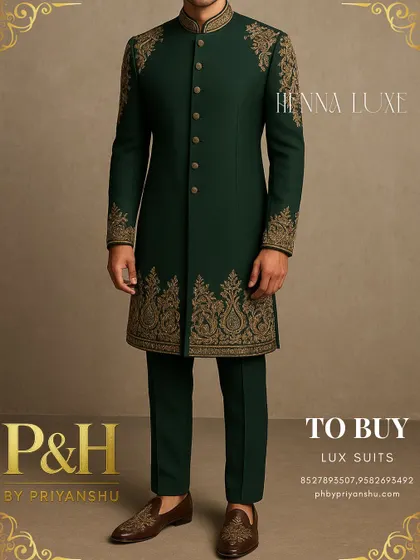 A three-quarter view of the green suit, highlighting the artistry of the hand-embroidery.