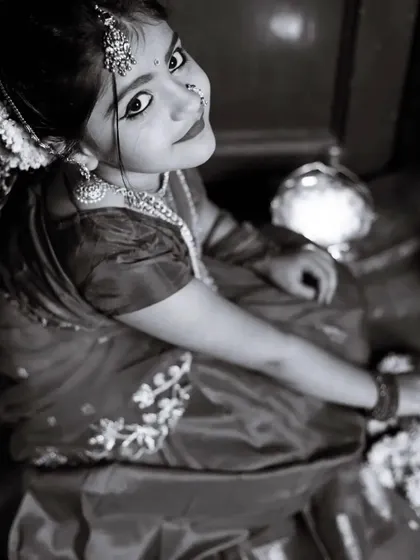 An artistic shot of Saanvi in her custom-designed traditional dress, looking absolutely angelic.