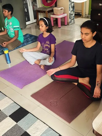 Kids sitting in Padmasana (Lotus Pose) for meditation. Teaching mindfulness early helps children navigate life's stresses with greater ease.