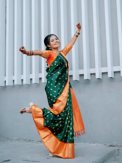 A joyful, celebratory jump from the bride, capturing the excitement of her engagement day.