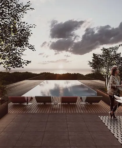 The rooftop pool and bar at the Kolgaon clubhouse. This space is designed to maximize views and create a social hub for the community, with an infinity edge that looks out over the Alibaug landscape.