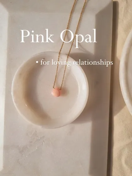 The 'Badamcha' Pink Opal heart-shaped drop pendant is for loving relationships.
