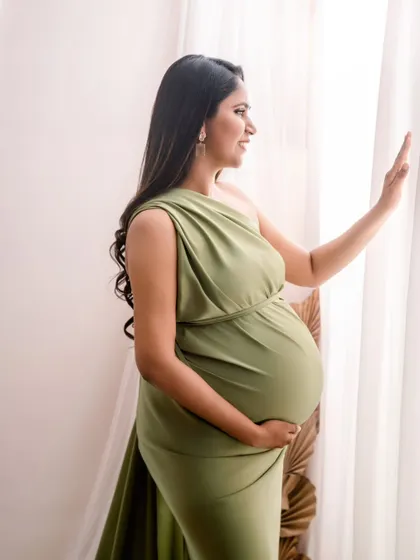 Looking towards the future. I love using natural window light to create soft, contemplative portraits that capture the anticipation of motherhood.