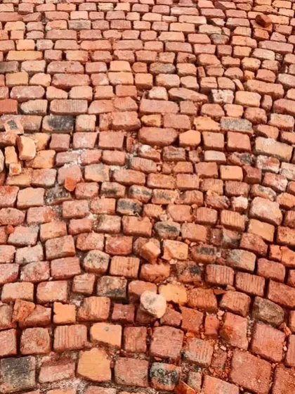 We often use traditional techniques like Brickbat Coba for waterproofing. This time-tested method provides excellent waterproofing and thermal insulation for flat roofs. It's a labor-intensive process, but we believe it offers the best long-term solution.