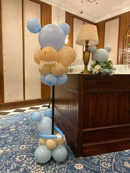 Mickey Mouse-shaped balloon sculptures used as decor accents around the venue.