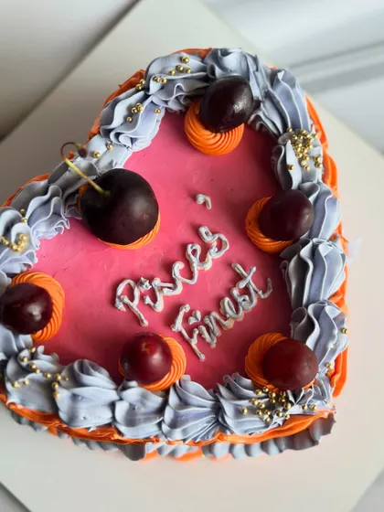 Soft, sweet, and full of Pisces charm. This heart-shaped minimal cake with fresh cherries is a dreamy treat for the Pisces in your life.