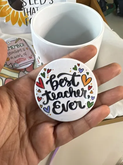 A classic "Best Teacher Ever" badge with colorful hearts. This design is always a bestseller.