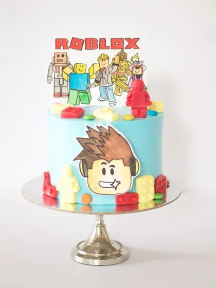 This Roblox theme cake is extra special because it features illustrations by the birthday boy himself! I love turning your kids' artwork into cake toppers. It's a delightful surprise for them and so much more personal than a plastic toy.